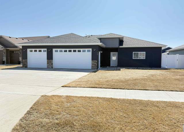 Property at 54 Mulberry Loop NE, Minot, ND 58703, 4 beds, 2 baths