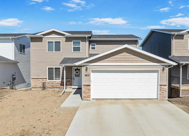Property at 2613 Granite Dr NW, Minot, ND 58703, 4 beds, 3 baths