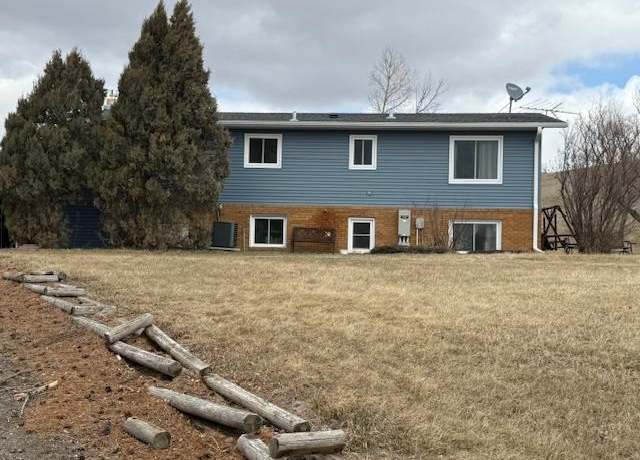 Property at 8610 County Road 15 W, Minot, ND 58703, 4 beds, 2.75 baths