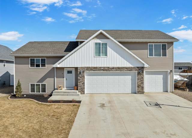 Property at 5 NE Olive Tree Cir, Minot, ND 58703, 5 beds, 3 baths