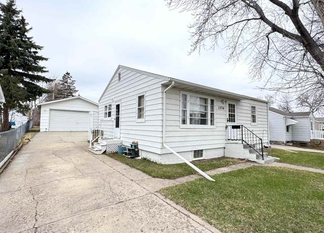 Property at 1324 Main St S, Minot, ND 58701, 2 beds, 1.75 baths