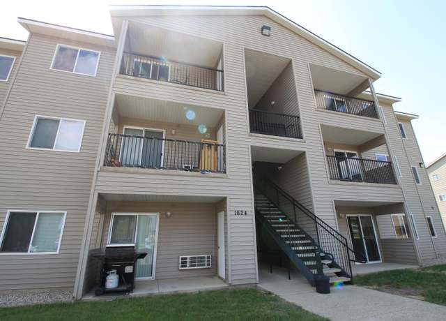 Property at 1624 20th Ave NW, Minot, ND 58703, 2 beds, 2 baths