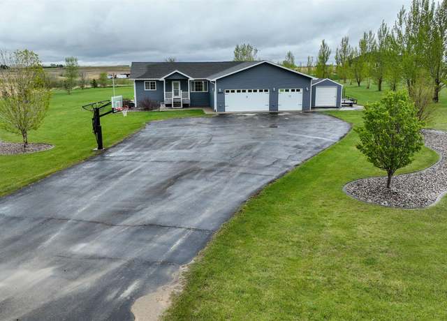 Property at 3030 Mustang Trl NE, Minot, ND 58703, 6 beds, 3 baths
