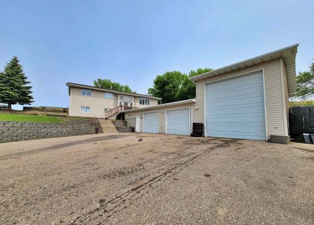 Property at 4920 10th Ave Ave NW, Minot, ND 58703, 5 beds, 3 baths