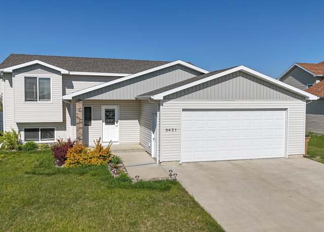 Property at 3421 8th St NE, Minot, ND 58703, 4 beds, 3 baths
