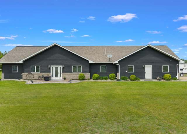 Property at 6125 11th Ave SE, Minot, ND 58701, 4 beds, 3.5 baths