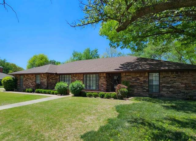 Property at 1614 Quailwood Dr, Enid, OK 73703, 4 beds, 3 baths