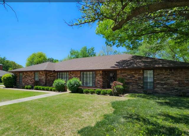 Property at 1614 Quailwood Dr, Enid, OK 73703, 4 beds, 3 baths