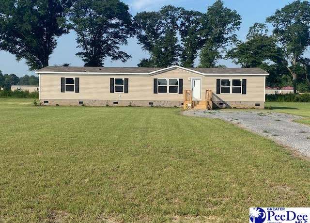 Property at 2406 Nature Dr, Latta, SC 29565, 4 beds, 2 baths
