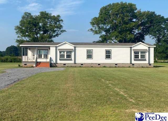 Property at 2418 Nature Dr, Latta, SC 29565, 4 beds, 2.5 baths