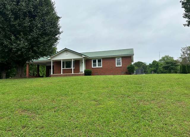 Property at 13890 Church St, Atwood, TN 38220, 3 beds, 2 baths