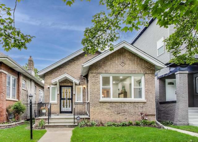 Property at 7707 S Ridgeland Ave, Chicago, IL 60649, 4 beds, 2 baths