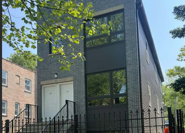 Property at 1051 N Springfield Ave, Chicago, IL 60651, 6 beds, 3 baths