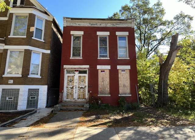 Property at 6345 S Carpenter St, Chicago, IL 60621, 4 beds, 2 baths