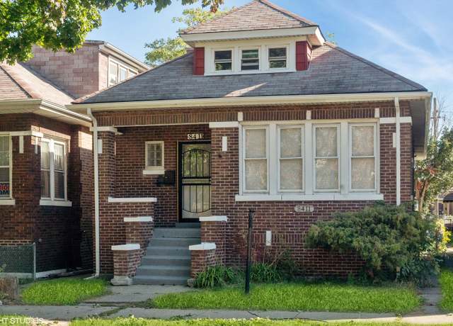 Property at 8411 S Paxton Ave, Chicago, IL 60617, 5 beds, 3 baths