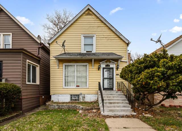 Property at 7526 S Merrill Ave, Chicago, IL 60649, 4 beds, 2.5 baths
