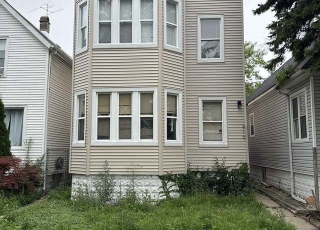 Property at 310 W 105th St, Chicago, IL 60628, 4 beds, 2 baths