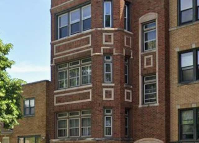 Property at 7539 S Yates Blvd, Chicago, IL 60649, 6 beds, 3 baths