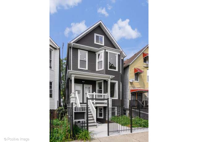 Property at 4928 W Erie St, Chicago, IL 60644, 9 beds, 4 baths