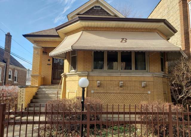 Property at 8242 S Marshfield Ave, Chicago, IL 60620, 5 beds, 2.5 baths