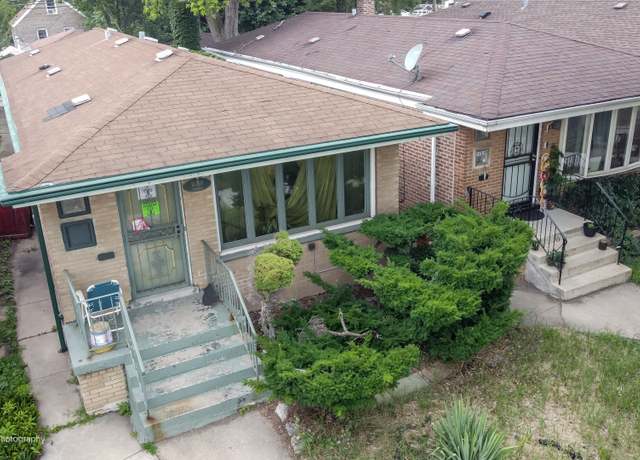 Property at 10240 S Torrence Ave, Chicago, IL 60617, 4 beds, 2 baths