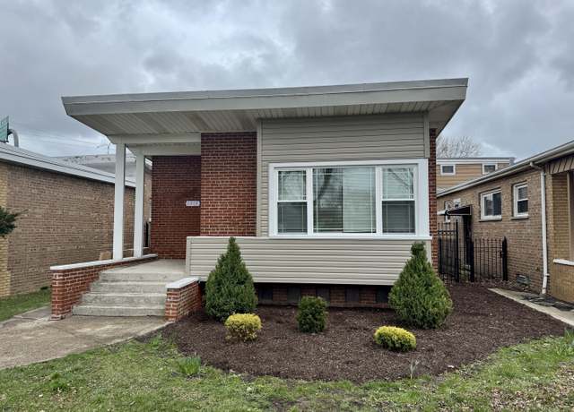 Property at 8909 S Phillips Ave, Chicago, IL 60617, 4 beds, 2 baths