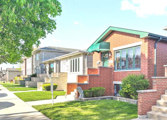 Property at 4215 S Emerald Ave, Chicago, IL 60609, 4 beds, 3 baths