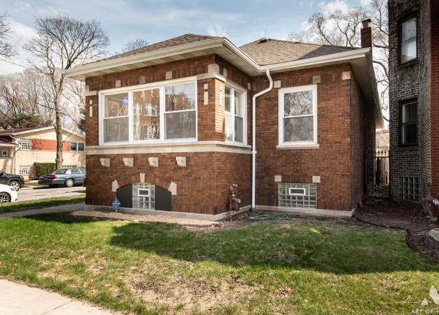 Property at 7701 S Chappel Ave, Chicago, IL 60649, 5 beds, 2 baths
