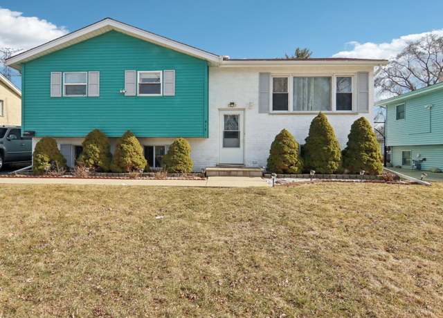 Property at 415 S Cherry Hill Ct, Addison, IL 60101, 5 beds, 2 baths