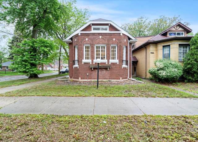 Property at 7658 S Luella Ave, Chicago, IL 60649, 4 beds, 2 baths