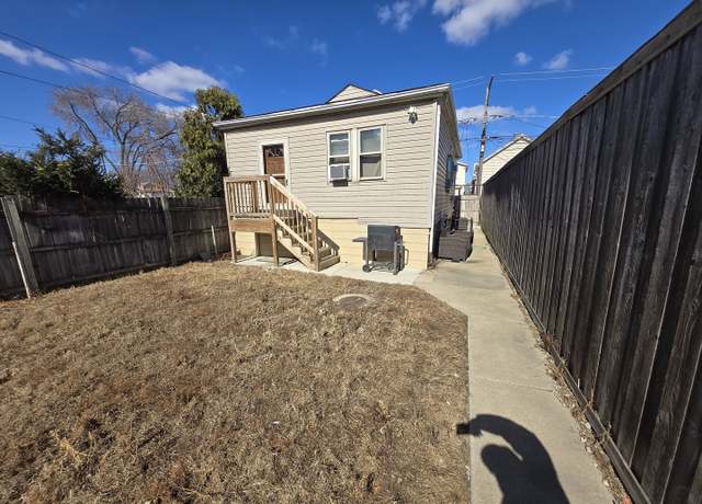 Property at 5750 W 65th St, Chicago, IL 60638, 4 beds, 2 baths