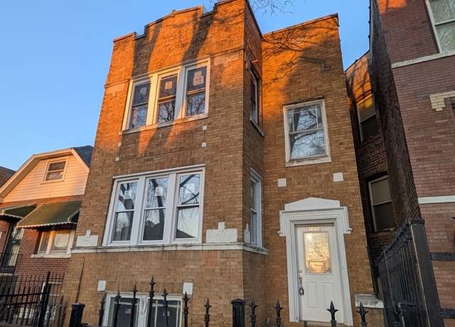 Property at 1009 N Harding Ave, Chicago, IL 60651, 4 beds, 2 baths