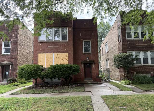 Property at 7148 S Eberhart Ave, Chicago, IL 60619, 4 beds, 2 baths