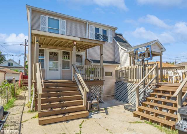 Property at 2150 N Mcvicker Ave, Chicago, IL 60639, 7 beds, 4.5 baths