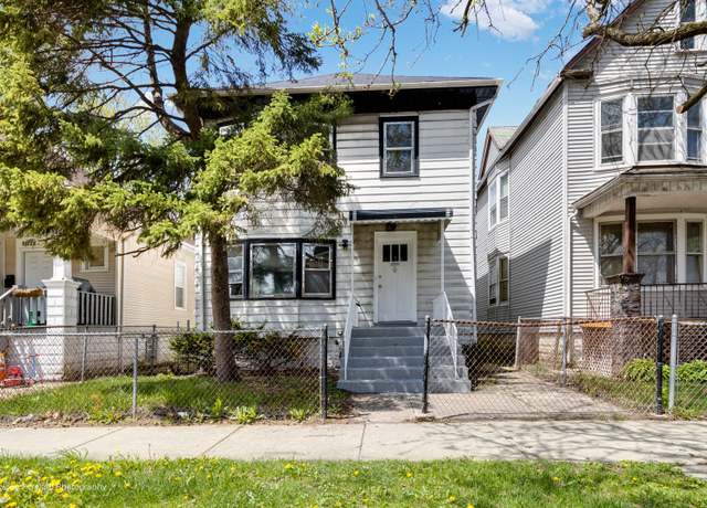 Property at 10722 S Prairie Ave, Chicago, IL 60628, 5 beds, 2 baths