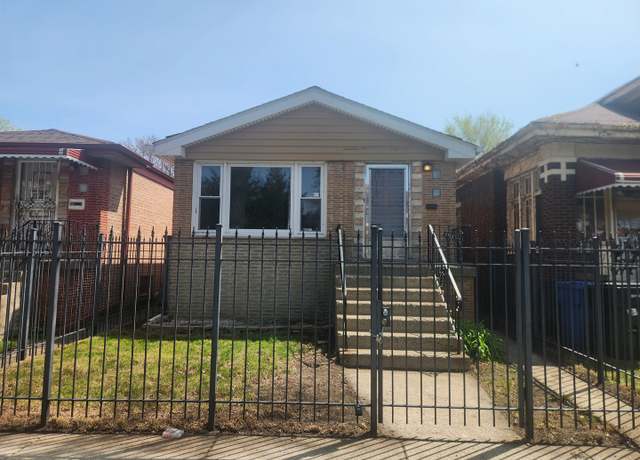 Property at 7553 S Paxton Ave, Chicago, IL 60649, 3 beds, 1.5 baths