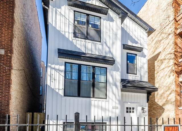 Property at 6126 S Eberhart Ave, Chicago, IL 60637, 9 beds, 6 baths