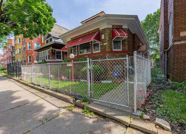 Property at 8221 S Marshfield Ave, Chicago, IL 60620, 8 beds, 3 baths