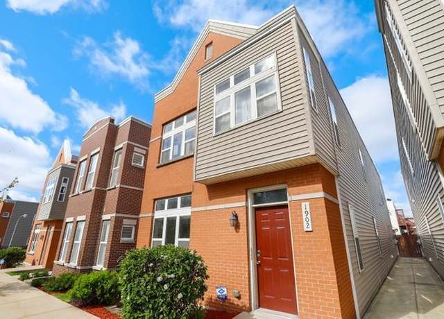 Property at 1902 N Laramie Ave Unit A, Chicago, IL 60639, 4 beds, 3 baths
