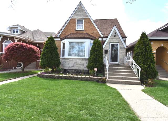 Property at 5633 W Henderson St, Chicago, IL 60634, 5 beds, 3 baths