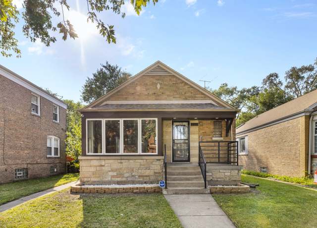 Property at 7450 S Bennett Ave, Chicago, IL 60649, 5 beds, 2.5 baths