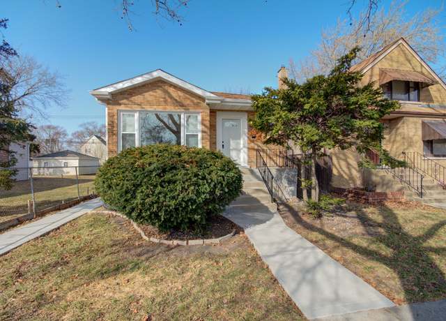 Property at 9230 S Greenwood Ave, Chicago, IL 60619, 3 beds, 2 baths