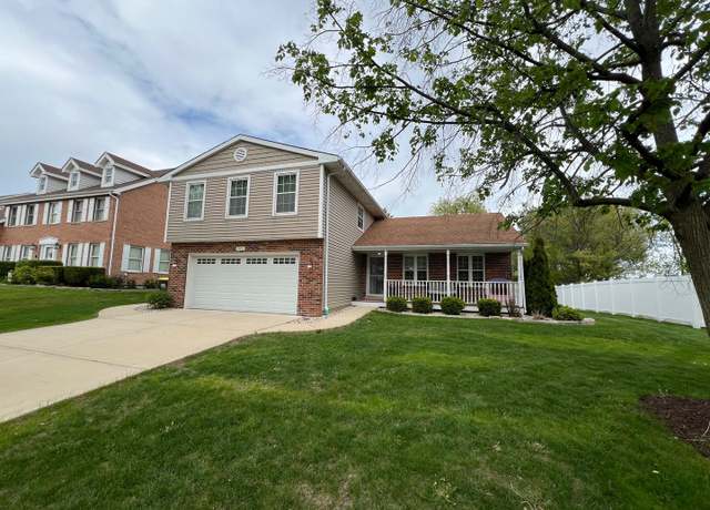 Property at 945 Williamsburg St, Westmont, IL 60559, 4 beds, 2.5 baths