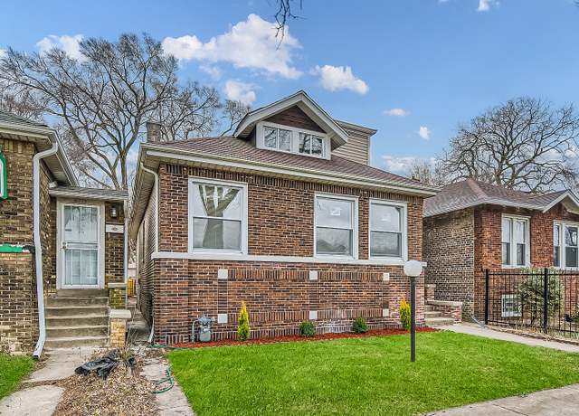 Property at 8217 S Woodlawn Ave, Chicago, IL 60619, 4 beds, 3 baths
