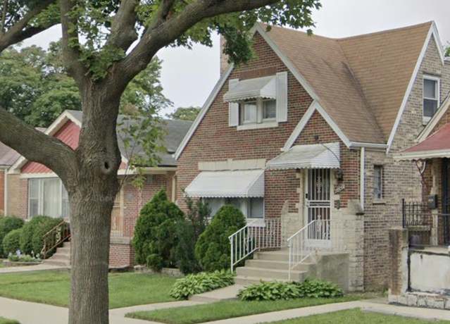 Property at 10350 S Eberhart Ave, Chicago, IL 60628, 4 beds, 2 baths