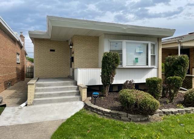 Property at 9035 S Oglesby Ave, Chicago, IL 60617, 4 beds, 2 baths
