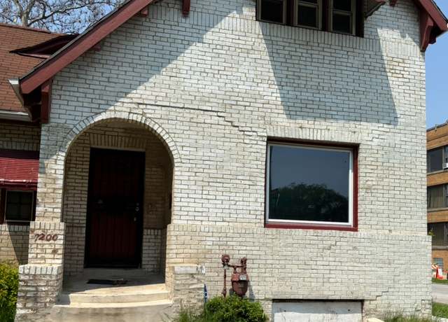 Property at 7200 S Yates Blvd, Chicago, IL 60649, 4 beds, 1.5 baths