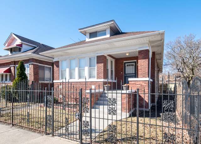 Property at 8018 S Luella Ave, Chicago, IL 60617, 4 beds, 3 baths