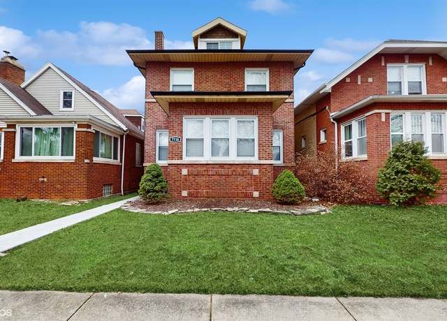 Property at 7738 S Bennett Ave, Chicago, IL 60649, 4 beds, 2.5 baths