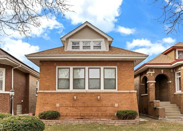 Property at 9320 S Racine Ave, Chicago, IL 60620, 5 beds, 3 baths
